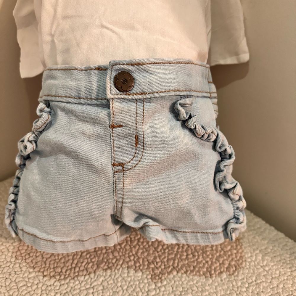 Garanimals denim shorts size 0-3 months. Stretch waist band. Frill design.